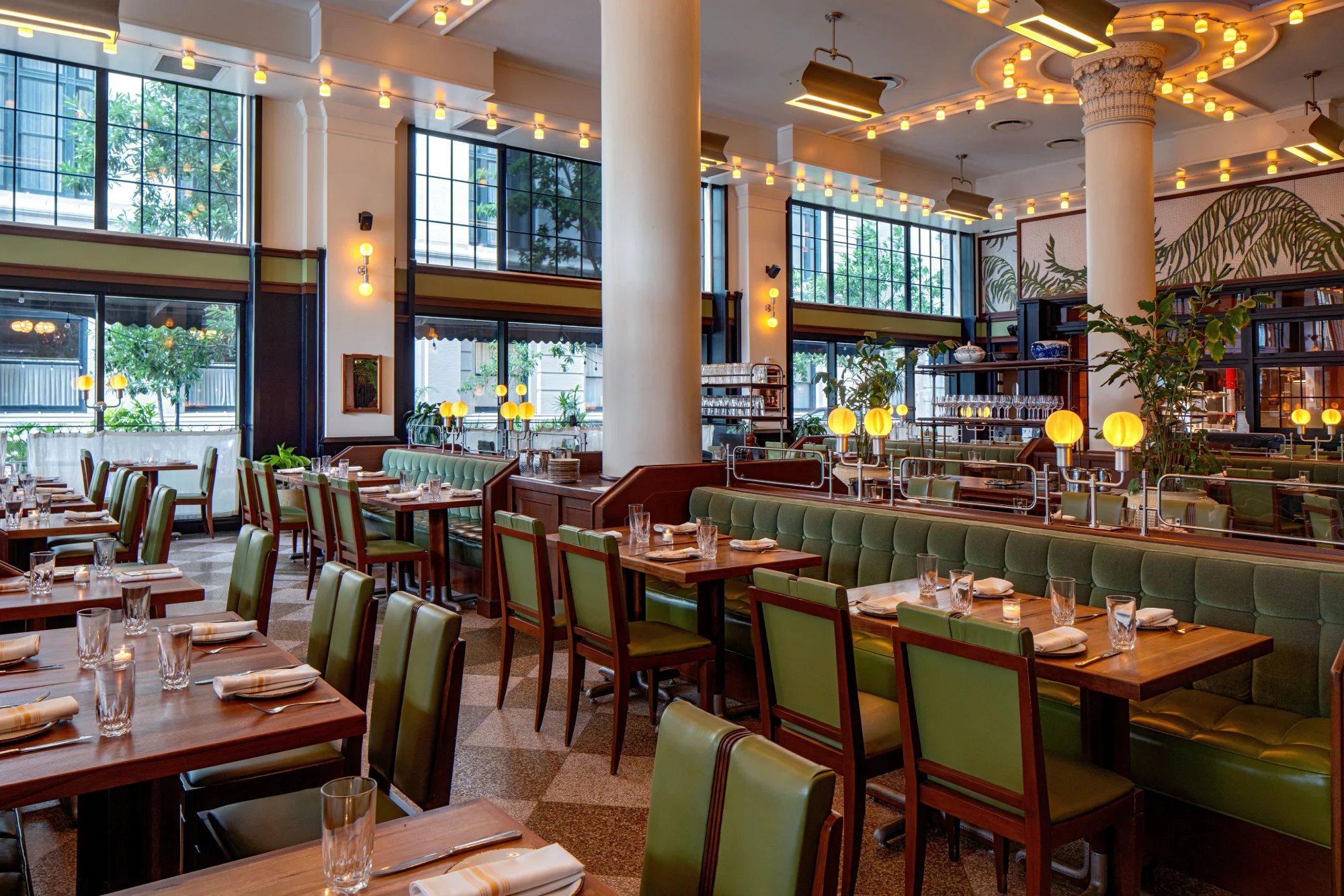 a restaurant with a lot of tables and chairs