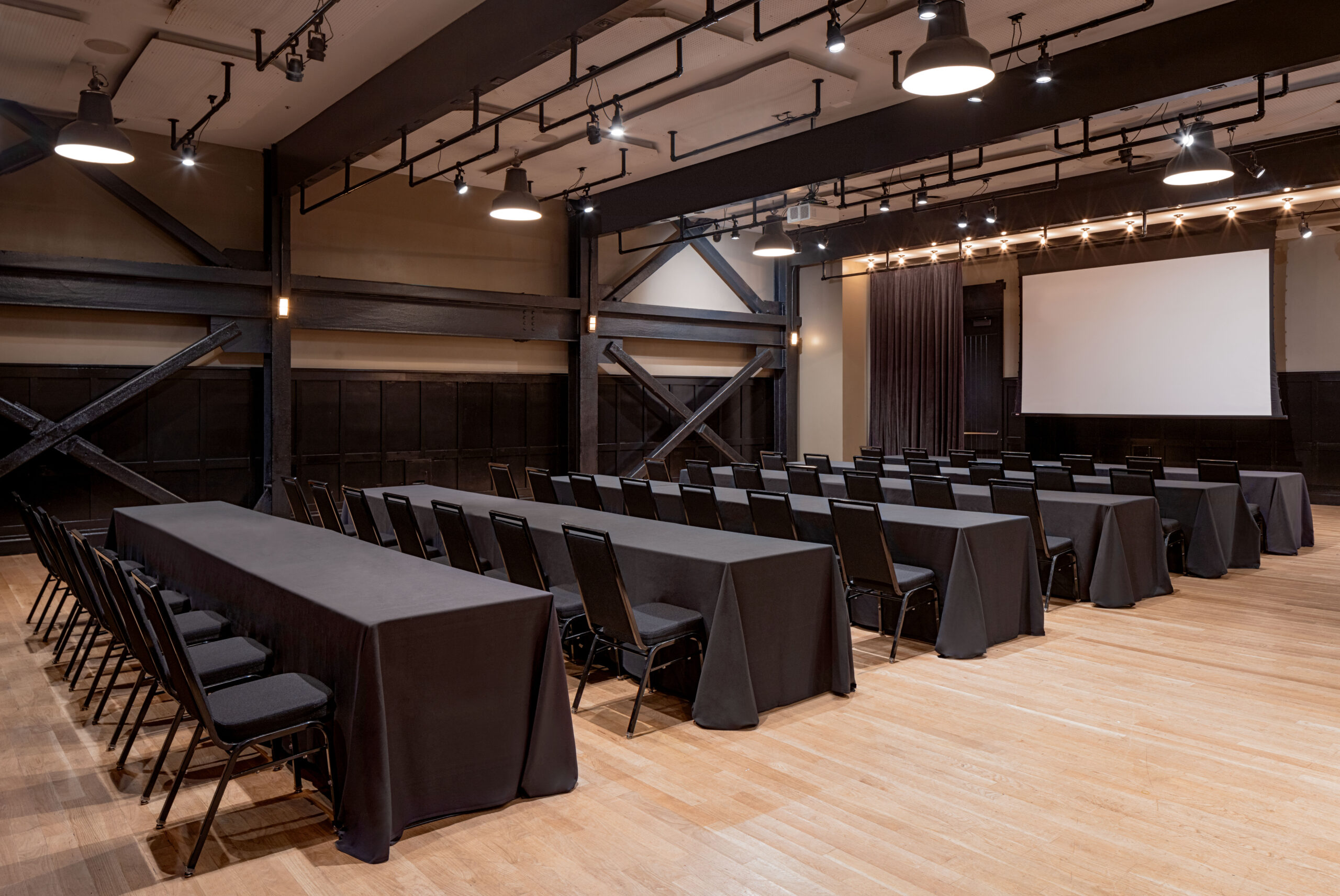 Professional shot of the large ballroom setup theater style for corporate meetings and events